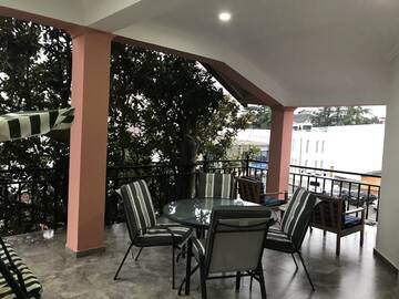 Фото номера Стандартный четырехместный номер Гостевой дом Magnolia Guest House г. Кобулети 2