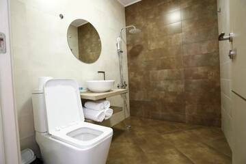 Фото номера Семейный номер с балконом Отель Hotel Homey Kobuleti г. Кобулети 15