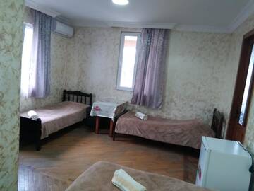 Фото номера Стандартный четырехместный номер Мини-отель Guest House Nika &amp; Nina г. Кобулети 9