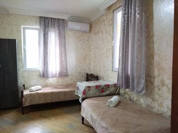 Фото номера Стандартный четырехместный номер Мини-отель Guest House Nika &amp; Nina г. Кобулети 10