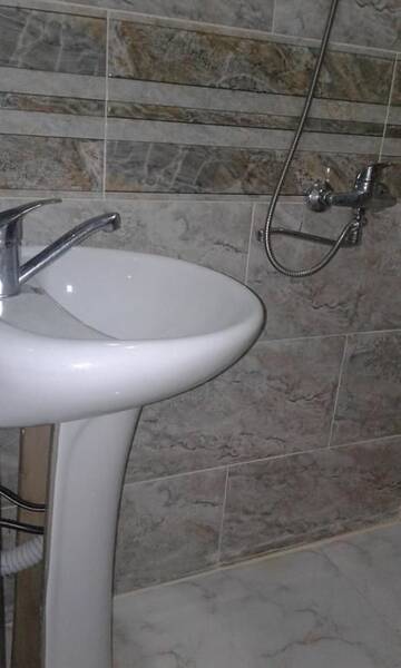 Фото номера Стандартный трехместный номер Гостевой дом An_old house г. Кобулети 12