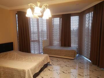 Фото номера Классический четырехместный номер Гостевой дом Guest House Gugagio г. Кобулети 6