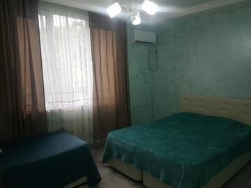 Фото номера Трехместный номер «Комфорт» с душем Гостевой дом Guest House Gugagio г. Кобулети 4