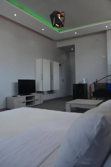 Фото номера Четырехместный номер с видом на море Отель Kent Hotel г. Кобулети 6
