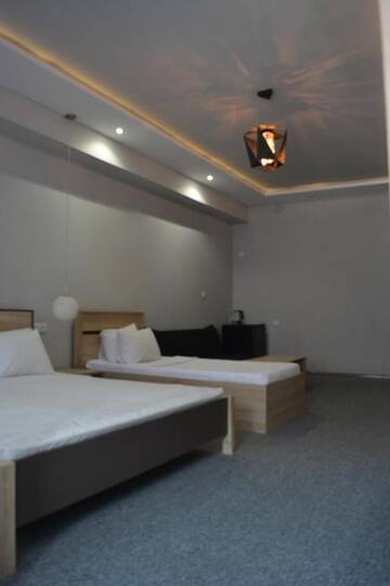 Фото номера Трехместный номер Делюкс Отель Kent Hotel г. Кобулети 7