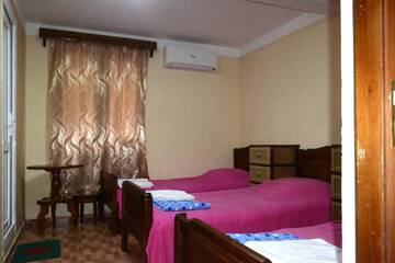 Фото номера Четырехместный номер с душем Гостевой дом Guest House Our house г. Кобулети 2