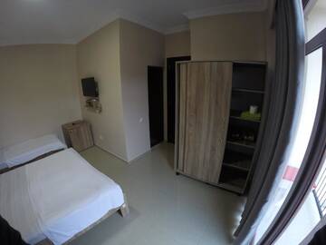 Фото номера Трехместный номер с ванной комнатой Отель Hotel Estonia Two г. Кобулети 4
