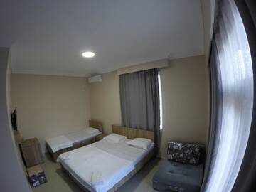 Фото номера Трехместный номер с ванной комнатой Отель Hotel Estonia Two г. Кобулети 2