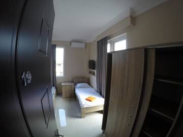 Фото номера Двухместный номер с 2 отдельными кроватями и ванной Отель Hotel Estonia Two г. Кобулети 2