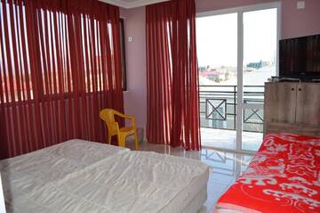 Фото номера Трехместный номер с балконом Курортные отели Hotel Near the Sea г. Кобулети 26