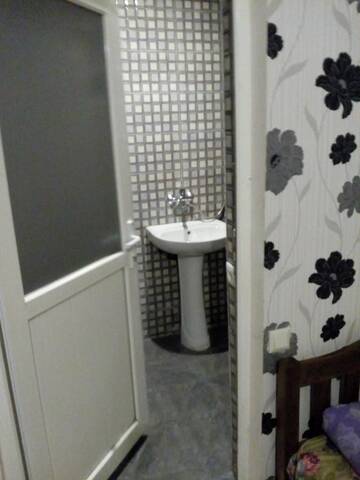 Фото номера Стандартный четырехместный номер Курортные отели Mini Hotel on Guramishvili 22 г. Кобулети 8