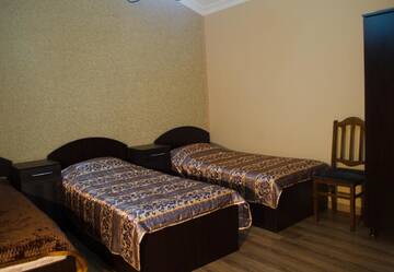 Фото номера Трехместный номер с ванной комнатой Гостевой дом Guest House Rustaveli г. Кобулети 20