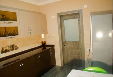 Фото номера Трехместный номер с ванной комнатой Гостевой дом Guest House Rustaveli г. Кобулети 3