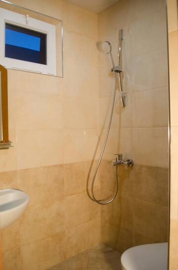 Фото номера Трехместный номер с ванной комнатой Гостевой дом Guest House Rustaveli г. Кобулети 10