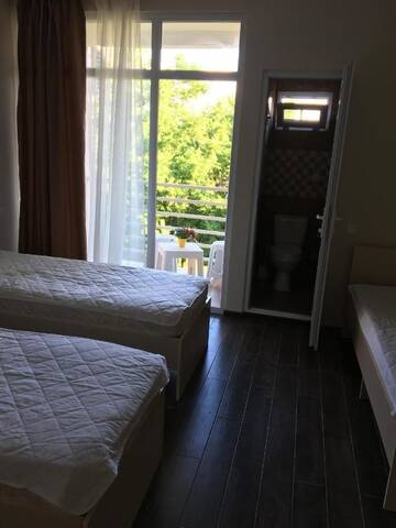 Фото номера Cемейный номер с собственной ванной комнатой Гостевой дом Guest House Kobuleti on Aghmashenebeli г. Кобулети 6
