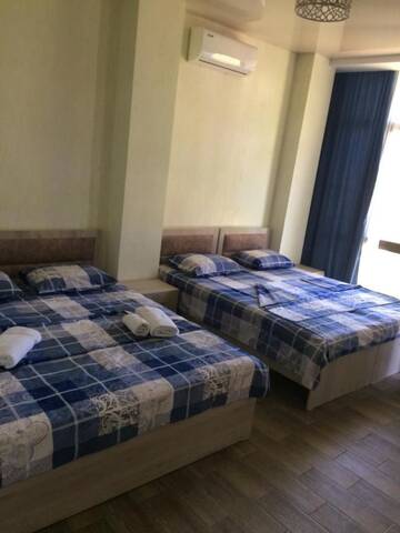 Фото номера Классический четырехместный номер Гостевой дом Guesthouse in Qobuleti г. Кобулети 7