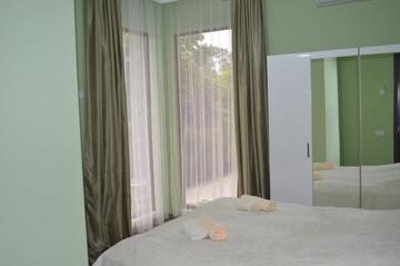 Фото номера Большой двухместный номер с 1 кроватью Отель Lia Guest House г. Кобулети 18
