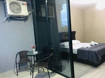 Фото номера Большой двухместный номер с 1 кроватью Отель K. Beach Hotel г. Кобулети 7