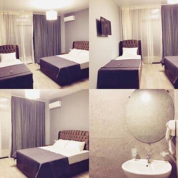 Фото номера Трехместный номер Отель K. Beach Hotel г. Кобулети 5