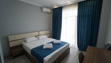 Фото номера Стандартный двухместный номер с 1 кроватью Отель hotel horizon г. Кобулети 13