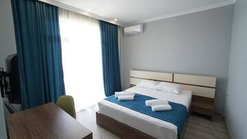 Фото номера Стандартный двухместный номер с 1 кроватью Отель hotel horizon г. Кобулети 14