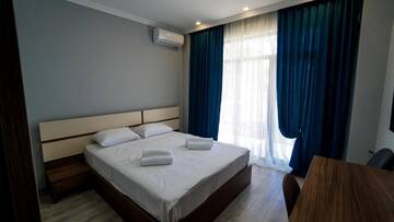 Фото номера Стандартный двухместный номер с 1 кроватью Отель hotel horizon г. Кобулети 12