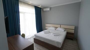 Фото номера Стандартный двухместный номер с 1 кроватью Отель hotel horizon г. Кобулети 24