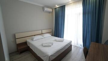 Фото номера Стандартный двухместный номер с 1 кроватью Отель hotel horizon г. Кобулети 8