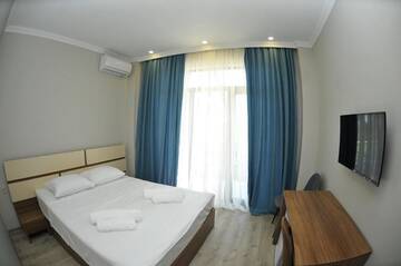 Фото номера Стандартный двухместный номер с 1 кроватью Отель hotel horizon г. Кобулети 32