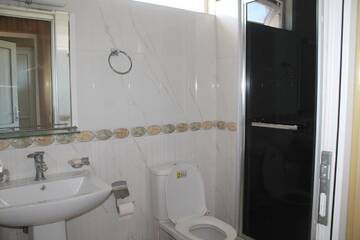 Фото номера Апартаменты с 3 спальнями Апарт-отели Hotel Villa Oasis г. Кобулети 12