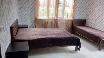 Фото номера Четырехместный номер с ванной комнатой Проживание в семье Natalia House г. Кобулети 3