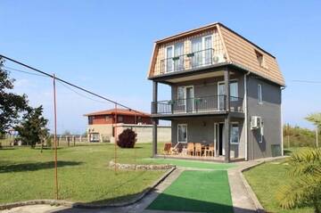 Фото номера Дом с 3 спальнями Дома для отпуска Дом на пляже Black sea House г. Кобулети 52