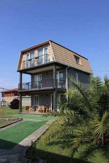 Фото номера Дом с 3 спальнями Дома для отпуска Дом на пляже Black sea House г. Кобулети 25