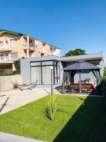 Фото номера Дом с 3 спальнями Дома для отпуска City House г. Кобулети 28